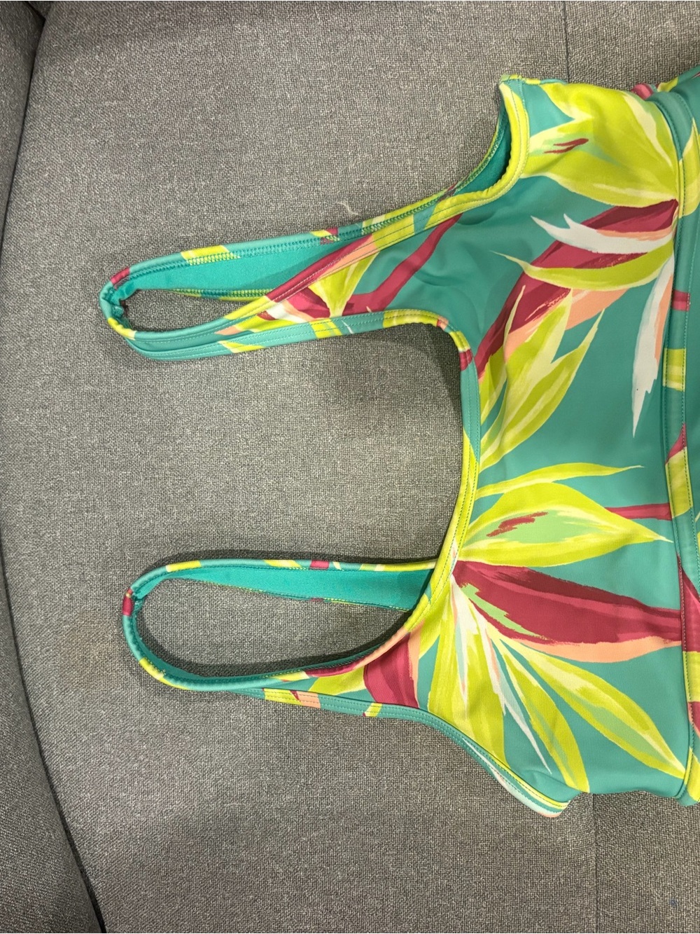 Kids turquoise garment with care tag